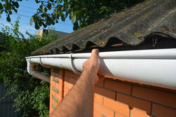commercial gutter services in progress